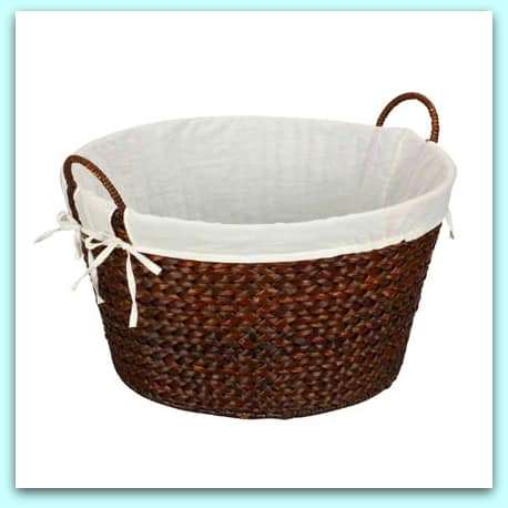   <img src="laundry basket.jpg" alt="Round woven laundry basket in brown with liner 